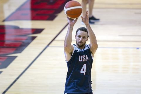 Stephen Curry of the Golden State Warriors shoots baskets during training camp for the United States men's basketball team Saturday, July 6, 2024, in Las Vegas. (AP Photo/Steve Marcus)