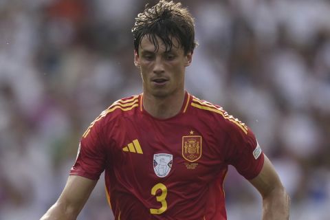 Spain's Robin Le Normand (3) dribbles during a quarter final match between Germany and Spain at the Euro 2024 soccer tournament in Stuttgart, Germany, Friday, July 5, 2024. (AP Photo/Antonio Calanni)