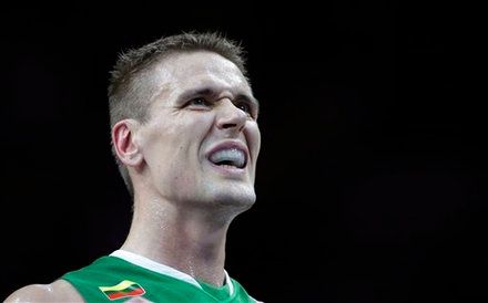 Robertas Javtokas from Lithuania grimaces during the EuroBasket European Basketball Championship quarterfinal match against Macedonia in Kaunas, Lithuania, Wednesday, Sept. 14, 2011. (AP Photo/Petr David Josek)