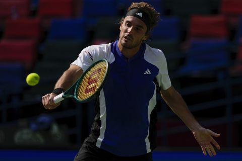 Stefanos Tsitsipas of Greece plays a backhand return against Alexandre Muller of France during the men's singles third round match in the Shanghai Masters tennis tournament at Qizhong Forest Sports City Tennis Center in Shanghai, China (AP Photo/Andy Wong)