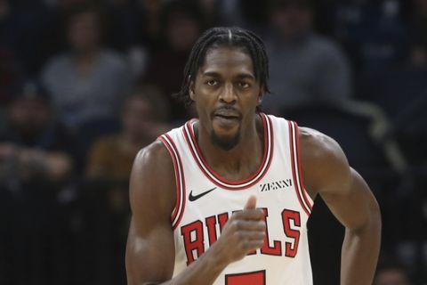 Chicago Bulls' Justin Holiday plays against the Minnesota Timberwolves in an NBA basketball game Saturday, Nov. 24, 2018, in Minneapolis. (AP Photo/Jim Mone)