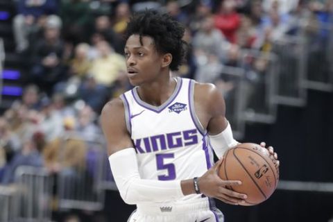 Sacramento Kings guard De'Aaron Fox (5) during the first half of an NBA basketball game against the Indiana Pacers in Indianapolis, Saturday, Dec. 8, 2018. (AP Photo/Michael Conroy)