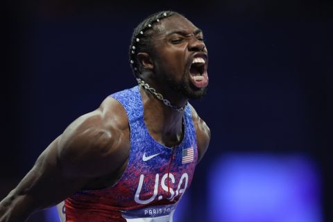 Noah Lyles of the United States shouts as he arrives in the stadium for the men's 100-meter final at the 2024 Summer Olympics, Sunday, Aug. 4, 2024, in Saint-Denis, France. (AP Photo/Rebecca Blackwell)