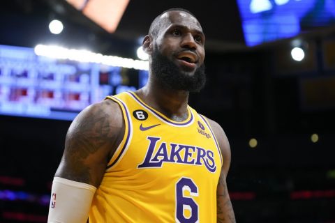 Los Angeles Lakers' LeBron James (6) reacts to a play during the first half of an NBA basketball game against the Houston Rockets Monday, Jan. 16, 2023, in Los Angeles. (AP Photo/Jae C. Hong)