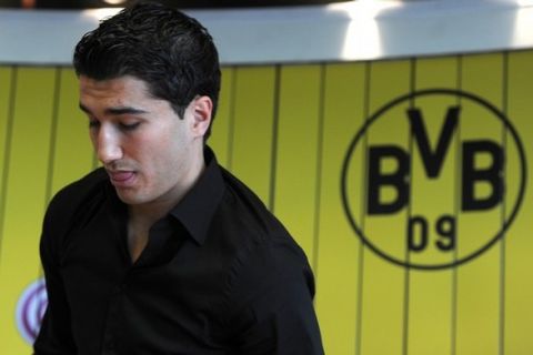 Dortmund's Turkish midfielder Nuri Sahin addresses a press conference in the western German city of Dortmund on May 9, 2011. Sahin will leave German League winners Dortmund and signed a contract with Spanish first division club Real Madrid.   AFP PHOTO / PATRIK STOLLARZ (Photo credit should read PATRIK STOLLARZ/AFP/Getty Images)