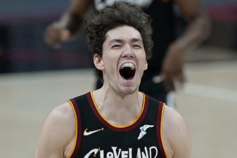 Cleveland Cavaliers' Cedi Osman reacts during double overtime of an NBA basketball game against the Brooklyn Nets, Wednesday, Jan. 20, 2021, in Cleveland. The Cavaliers won 147-135 in double-overtime. (AP Photo/Tony Dejak)