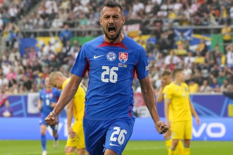 Slovakia's Ivan Schranz celebrates after scoring his side's opening goal during a Group E match between Slovakia and Ukraine at the Euro 2024 soccer tournament in Duesseldorf, Germany, Friday, June 21, 2024. (AP Photo/Andreea Alexandru)