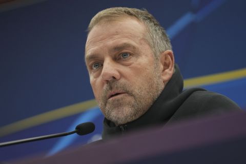 Barcelona's head coach Hansi Flick speaks during a news conference at the Rajko Mitic Stadium in Belgrade, Serbia, Tuesday, Nov. 5, 2024, ahead of the Champions League opening phase soccer match between Red Star and Barcelona on Wednesday. (AP Photo/Darko Vojinovic)