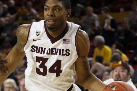 Dec 14, 2013; Tempe, AZ, USA; Arizona State Sun Devils guard Jermaine Marshall (34) drives on Grambling State Tigers during the second half at Wells Fargo Arena. The Sun Devils defeated the Tigers 97-55. Mandatory Credit: Rick Scuteri-USA TODAY Sports