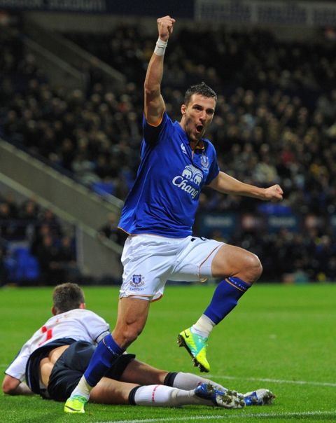 Everton's Greek striker Apostolos Vellios celebrates after scoring their second goal during the English Premier League football match between Bolton Wanderers and Everton at The Reebok Stadium in Bolton, north-west England on November 26, 2011. AFP PHOTO/ANDREW YATES

RESTRICTED TO EDITORIAL USE. No use with unauthorized audio, video, data, fixture lists, club/league logos or live services. Online in-match use limited to 45 images, no video emulation. No use in betting, games or single club/league/player publications (Photo credit should read ANDREW YATES/AFP/Getty Images)