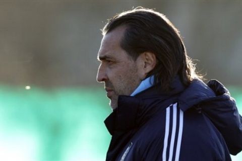 Argentina's coach Sergio Batista leaves after a training session in Buenos Aires, Argentina, Monday, July 4, 2011. Argentina is hosting the Copa America soccer tournament July 1-24.(AP Photo/Natacha Pisarenko)