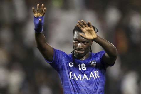 Al Hilal's Bafetimbi Gomis celebrates applauds fans at the end of the Club World Cup soccer match between Al Hilal FC and ES Tunis at Jassim Bin Hamad Stadium in Doha, Qatar, Saturday, Dec. 14, 2019. Al Hilal won 1-0. (AP Photo/Hassan Ammar)