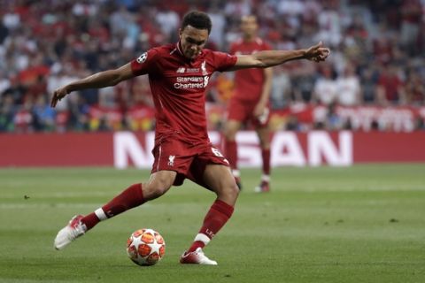 Liverpool's Trent Alexander-Arnold attempts a shot at goal during the Champions League final soccer match between Tottenham Hotspur and Liverpool at the Wanda Metropolitano Stadium in Madrid, Saturday, June 1, 2019. (AP Photo/Felipe Dana)