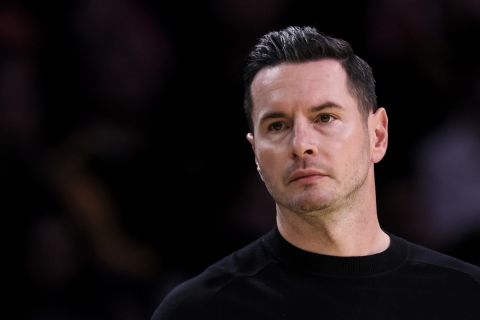 Los Angeles Lakers head coach JJ Redick reacts during the second half of an Emirates NBA Cup basketball game against the Utah Jazz, Tuesday, Nov. 19, 2024, in Los Angeles. (AP Photo/Etienne Laurent)