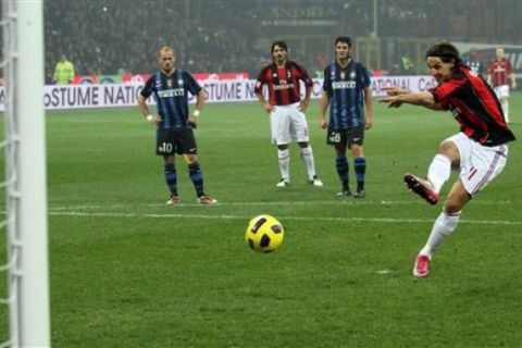 AC Milan forward Zlatan Ibrahimovic, of Sweden, scores  a penalty kick during the Serie A soccer match between Inter Milan and AC Milan at the San Siro stadium in Milan, Italy, Sunday, Nov. 14, 2010. (AP Photo/Felice Calabro')