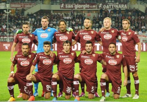 Torino'splayers before the start of the Italian Serie A soccer match between Torino and Hellas Verona at Olimpico Stadium in Turin, 21 September 2014. ANSA/ ANDREA DI MARCO 