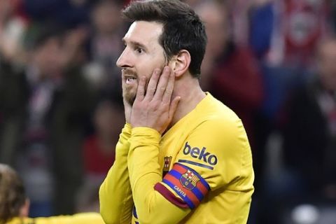 Barcelona's Lionel Messi reacts after a missed scoring opportunity during the Spanish Copa del Rey, quarter final, soccer match between Athletic Bilbao and Barcelona at San Mames stadium in Bilbao, Spain, Thursday, Feb. 6, 2020. (AP Photo/Alvaro Barrientos)