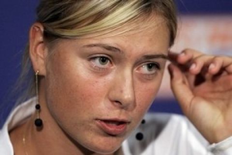 Maria Sharapova, of Russia, addresses the media after pulling out of the East West Bank Classic tennis tournament in Carson, Calif., due to a shin muscle injury, Saturday, Aug. 11, 2007.  (AP Photo/Mark J. Terrill)