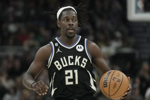 Milwaukee Bucks' Jrue Holiday during the first half of an NBA basketball game against the Utah Jazz Saturday, Dec. 17, 2022, in Milwaukee. (AP Photo/Morry Gash)