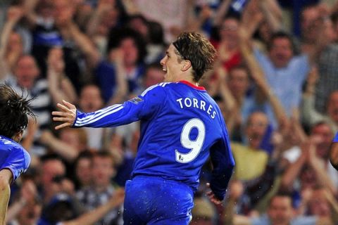 Chelsea's Spanish striker Fernando Torres celebrates scoring Chelsea's third goal (his first for the club) during the English Premier League football match between Chelsea and West Ham United at Stamford Bridge in London, on April 23, 2011. AFP PHOTO/GLYN KIRKFOR EDITORIAL USE ONLY Additional licence required for any commercial/promotional use or use on TV or internet (except identical online version of newspaper) of Premier League/Football League photos. Tel DataCo +44 207 2981656. Do not alter/modify photo. (Photo credit should read GLYN KIRK/AFP/Getty Images)