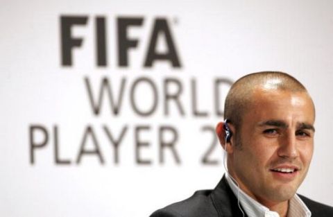 ZURICH, SWITZERLAND - DECEMBER 18:  Fabio Cannavaro of Italy and Real Madrid speaks to the media during a press conference prior to the FIFA World Player of the Year Awards ceremony at the Zurich Opera House on December 18, 2006 in Zurich, Switzerland.  (Photo by Christopher Lee/Getty Images)