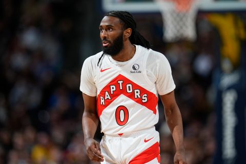 Toronto Raptors guard Javon Freeman-Liberty (0) in the second half of an NBA basketball game Monday, March 11, 2024, in Denver. (AP Photo/David Zalubowski)