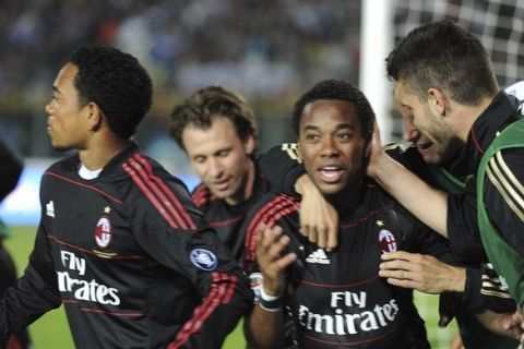 BRESCIA, ITALY - APRIL 23:  Rubinho of Milan celebrates with team mates after scoring  his opening goal during the Serie A match Brescia Calcio and AC Milan at Mario Rigamonti Stadium on April 23, 2011 in Brescia, Italy.  (Photo by Dino Panato/Getty Images)