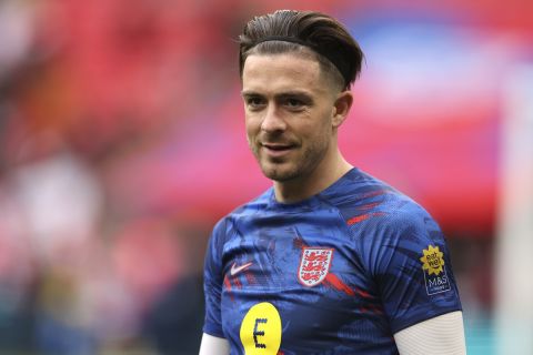 England's Jack Grealish smiles during the warming up of the the Euro 2024 group C qualifying soccer match between England and Ukraine at Wembley Stadium in London, Sunday, March 26, 2023.(AP Photo/Ian Walton)