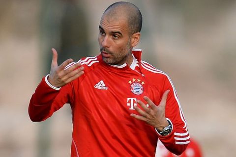 AGADIR, MOROCCO - DECEMBER 15:  Head coach Josep Guardiola gestures during a Bayern Muenchen training session for the FIFA Club World Cup outside at Agadir Stadium on December 15, 2013 in Agadir, Morocco.  (Photo by Lars Baron/Getty Images)