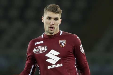 Torino's Lyanco controls the ball during a Serie A soccer match between Tonino and Spezia, at the Olympic stadium in Turin, Italy, Saturday, Jan. 16, 2021. (AP Photo/Luca Bruno)