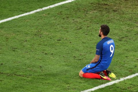 France's Olivier Giroud sits on the pitch during the Euro 2016 Group A soccer match between France and Albania at the Velodrome stadium in Marseille, France, Wednesday, June 15, 2016. (AP Photo/Claude Paris)