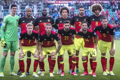 Belgium's team players pose before the World Cup Group H qualifying match between Estonia and Belgium at the A. Le Coq Arena in Tallinn, Estonia, Friday, June 9, 2017. From left, first row, Kevin de Bruyne, Toby Alderweireld, Yannick Carrasco, Dries Mertens, Jan Vertonghen; from left, second row, Thibaut Courtois, Vincent Kompany, Romelu Lukaku, Axel Witsel, Nacer Chadli, Marouane Fellani. (AP Photo/Marko Mumm)