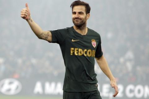 Monaco midfielder Cesc Fabregas reacts during the League One soccer match between Marseille and Monaco at the Velodrome stadium, in Marseille, southern France, Sunday, Jan. 13, 2019. (AP Photo/Claude Paris)