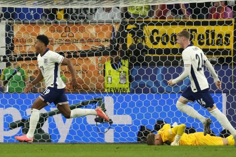 England's Ollie Watkins celebrates with England's Cole Palmer, right, after scoring his sides second goal during a semifinal match between the Netherlands and England at the Euro 2024 soccer tournament in Dortmund, Germany, Wednesday, July 10, 2024. (AP Photo/Frank Augstein)