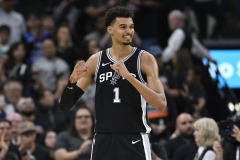 San Antonio Spurs forward Victor Wembanyama celebrates a basket late in the second half of an NBA basketball game against the Golden State Warriors, Saturday, Nov. 23, 2024, in San Antonio. San Antonio won 104-94. (AP Photo/Darren Abate)