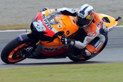 Honda rider Dani Pedrosa of Spain leans into a corner during the second free practice session ahead of the Grand Prix of Japan at the Twin Ring Motegi circuit in Motegi on September 30, 2011. Pedrosa clocked the fastest lap of 1 minute 46.790.    AFP PHOTO / TOSHIFUMI KITAMURA (Photo credit should read TOSHIFUMI KITAMURA/AFP/Getty Images)