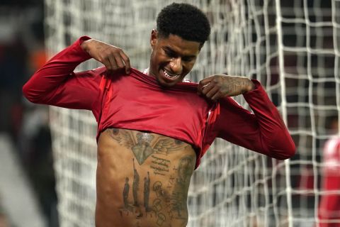 Manchester United's Marcus Rashford reacts after missing a chance during the Europa League opening phase soccer match between Manchester United and PAOK at the Old Trafford stadium in Manchester, England, Thursday, Nov. 7, 2024. (AP Photo/Dave Thompson)