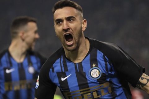 Inter Milan's Matias Vecino celebrates after scoring his side's opening goal during a Serie A soccer match between AC Milan and Inter Milan, at the San Siro stadium in Milan, Italy, Sunday, March 17, 2019. (AP Photo/Luca Bruno)