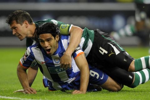 FC Portos forward from Colombia Radamel Falcao (Bottom) celebrates after scoring during the Portuguese Super League football match between FC Porto and Sporting CP, at the Dragao Stadium in Porto, on April 17, 2011.  AFP PHOTO / MIGUEL RIOPA (Photo credit should read MIGUEL RIOPA/AFP/Getty Images)