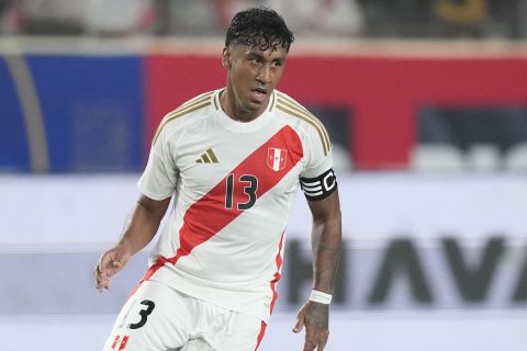 Peru's Renato Tapia dribbles the ball during the international friendly soccer match against Paraguay at Monumental Stadium in Lima, Peru, Friday, June 7, 2024. (AP Photo/Martin Mejia)