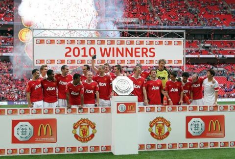 Manchester United celebrate winning the FA Community Shield football match against Chelsea at Wembley Stadium in London, England, on August 8, 2010. AFP PHOTO/GLYN KIRK

RESTRICTED FOR EDITORIAL USE/ NO COMMERCIAL USE (Photo credit should read GLYN KIRK/AFP/Getty Images)(Photo Credit should Read /AFP/Getty Images)