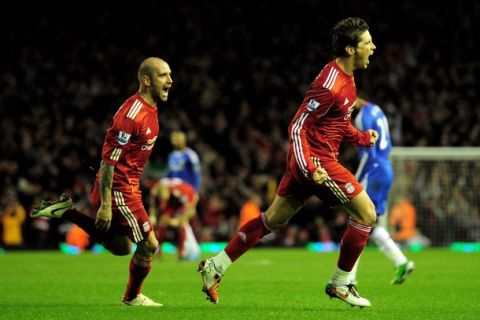 LIVERPOOL, ENGLAND - NOVEMBER 07:  Fernando Torres (R) of Liverpool celebrates scoring his team's second goal with team mate Raul Meireles during the Barclays Premier League match between Liverpool and Chelsea at Anfield on November 7, 2010 in Liverpool, England.  (Photo by Shaun Botterill/Getty Images)