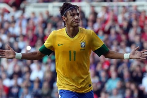 MIDDLESBROUGH, ENGLAND - JULY 20:  Neymar of Brazil celebrates scoring a penalty during the international friendly match between Team GB and Brazil at Riverside Stadium on July 20, 2012 in Middlesbrough, England.  (Photo by Julian Finney/Getty Images)