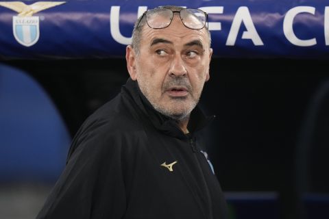 Lazio's head coach Maurizio Sarri walks to the bench before the Champions League, group E, soccer match between Lazio and Celtic at Rome's Olympic stadium, Tuesday, Nov. 28, 2023. (AP Photo/Alessandra Tarantino)