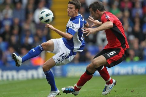 BIRMINGHAM, ENGLAND - AUGUST 21:  Matt Derbyshire (L) of Birmingham contests with Ryan Nelsen of Blackburn during the Barclays Premier League match between Birmingham City and Blackburn Rovers at St Andrew's Stadium on August 21, 2010 in Birmingham, England.  (Photo by Hamish Blair/Getty Images)