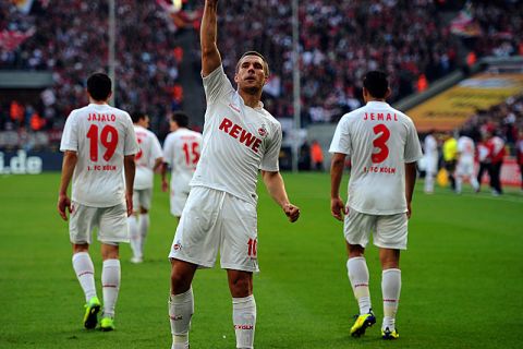 COLOGNE, GERMANY - OCTOBER 30:  Lukas Podolski of Koeln celebrates after scoring his teams first goal during the Bundesliga match between 1. FC Koeln and FC Augsburg at RheinEnergieStadion on October 30, 2011 in Cologne, Germany.  (Photo by Lars Baron/Bongarts/Getty Images)