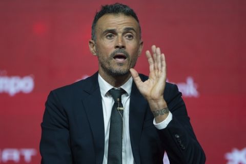 Spanish coach Luis Enrique talks to journalists during his official presentation as Spain new head coach in Las Rozas, outskirts Madrid, Thursday, July 19, 2018. (AP Photo/Francisco Seco)