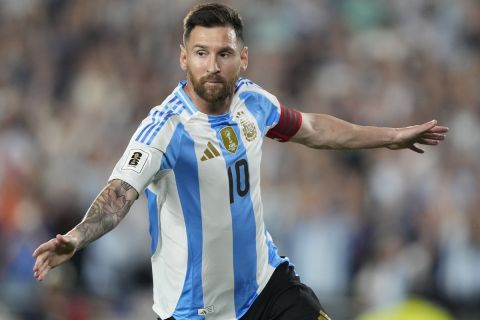 Argentina's Lionel Messi celebrates after scoring his side's opening goal against Bolivia during a World Cup 2026 qualifying soccer match at Monumental stadium in Buenos Aires, Argentina, Tuesday, Oct. 15, 2024. (AP Photo/Natacha Pisarenko)