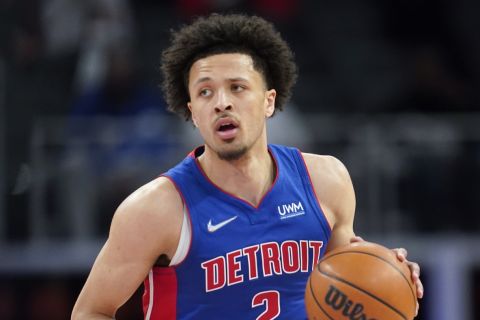 Detroit Pistons guard Cade Cunningham plays against the Portland Trail Blazers in the first half of an NBA basketball game in Detroit, Monday, March 21, 2022. (AP Photo/Paul Sancya)