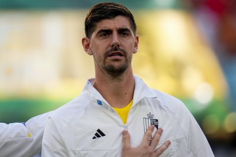 Belgium's goalkeeper Thibaut Courtois sings his national anthem prior to a World Cup group F soccer match between Belgium and Morocco at the Al Thumama Stadium in Doha, Qatar, Sunday, Nov. 27, 2022. (AP Photo/Manu Fernandez)